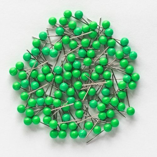 Hellgrüne Stecknadeln